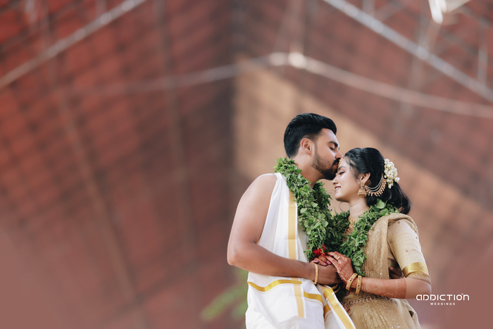 Newlyweds sharing a traditional wedding moment